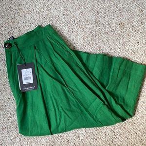 Pleated green knee length skirt
